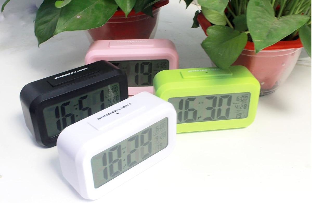Digital Alarm Clock with LCD Display, Desk Smart Electronic Small Clock with Indoor Temperature, Date, Light Sensor, Backlight, Battery Operated, for Home Bedroom Kids Office (Pink)