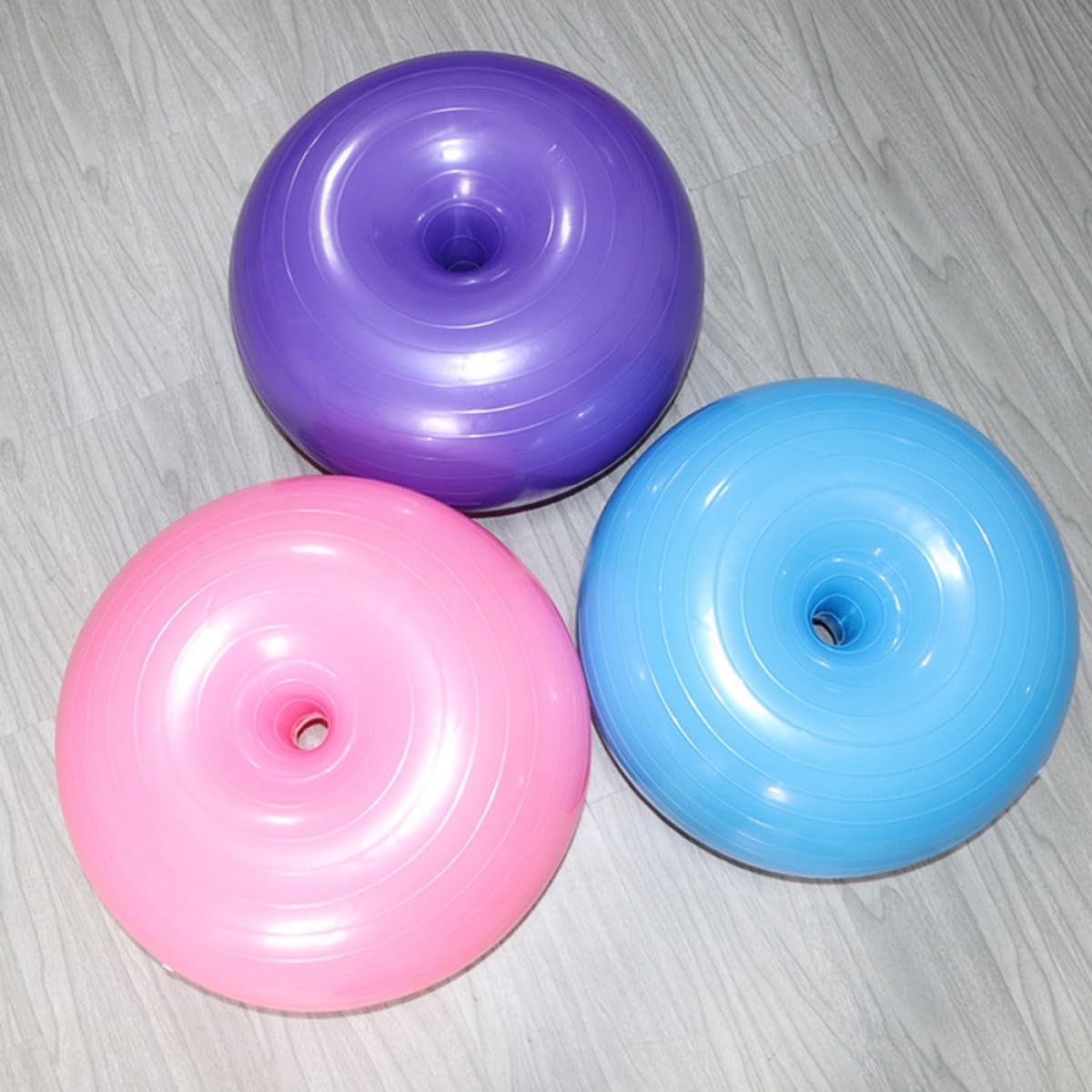 Donut Workout Ball PVC Explosion-Proof Yoga Ball with Air Pump for Pilates Home Gym Fitness and Balance Training in Light Pink
