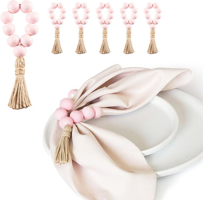 6-Pack Jute Napkin Rings with Gold Wooden Beads and Tassels – Rustic Farmhouse Table Decor, Elastic Handmade Napkin Holders for Dinner Parties, Weddings, Everyday Use (Pink, Medium)