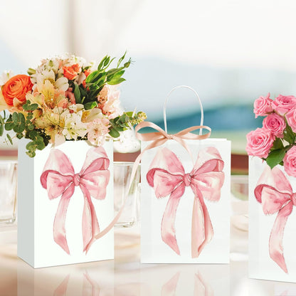12PCS Coquette Pink Bow Paper Gift Bags, Party Favor Bags, Pink Goodie Bags for Birthday&Bachelorette Party Decoration Coquette Bow Gift Pouches with Handles 8.3x5.9x3.1 Inch