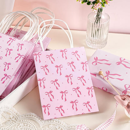 WRAPAHOLIC 12 Pack 7" Small Kraft Pink Bow Paper Gift Bags - Pink Ribbon Bow Gift Bags for Girls Birthday, Baby Shower, Wedding, Bridal Shower