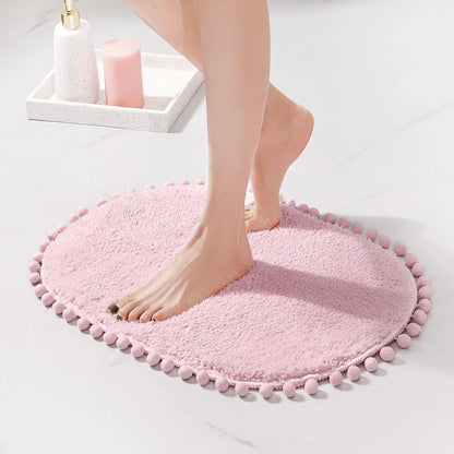 YIRDDEO Bath Mat Pink Rug with Pom Oval Bathroom Rugs for Bedroom Non Slip Cute Boho Absorbent Mats Soft Plush Washable Rug (20 x 30 inches)