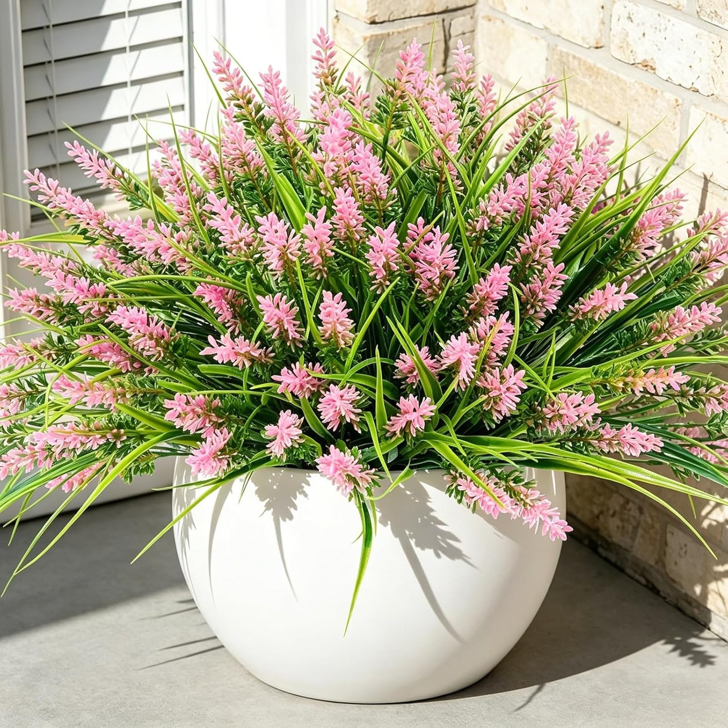 12Pcs Artificial Fake Flowers Monkey Grass for Outdoors, UV Resistant Realistic No Fade Faux Greenery Plants with Pink Flowers for Planter Home Garden Porch Patio Window Box