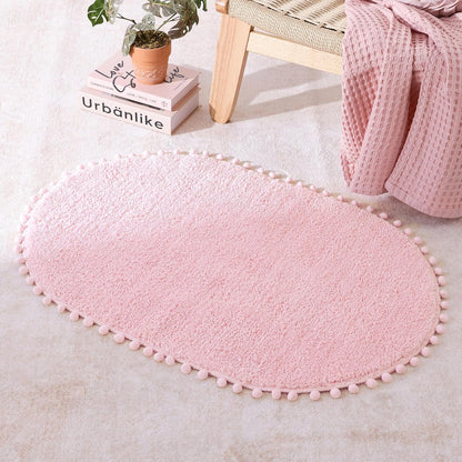 YIRDDEO Bath Mat Pink Rug with Pom Oval Bathroom Rugs for Bedroom Non Slip Cute Boho Absorbent Mats Soft Plush Washable Rug (24x36 inches)