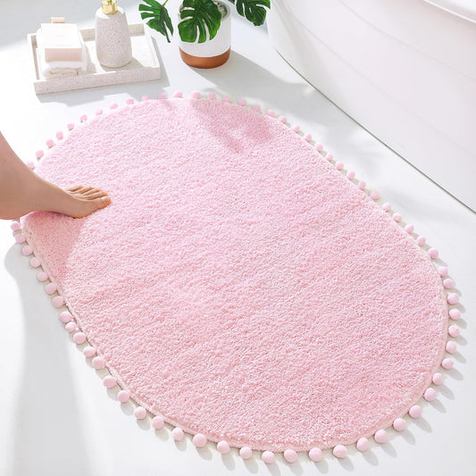 YIRDDEO Bath Mat Pink Rug with Pom Oval Bathroom Rugs for Bedroom Non Slip Cute Boho Absorbent Mats Soft Plush Washable Rug (24x36 inches)