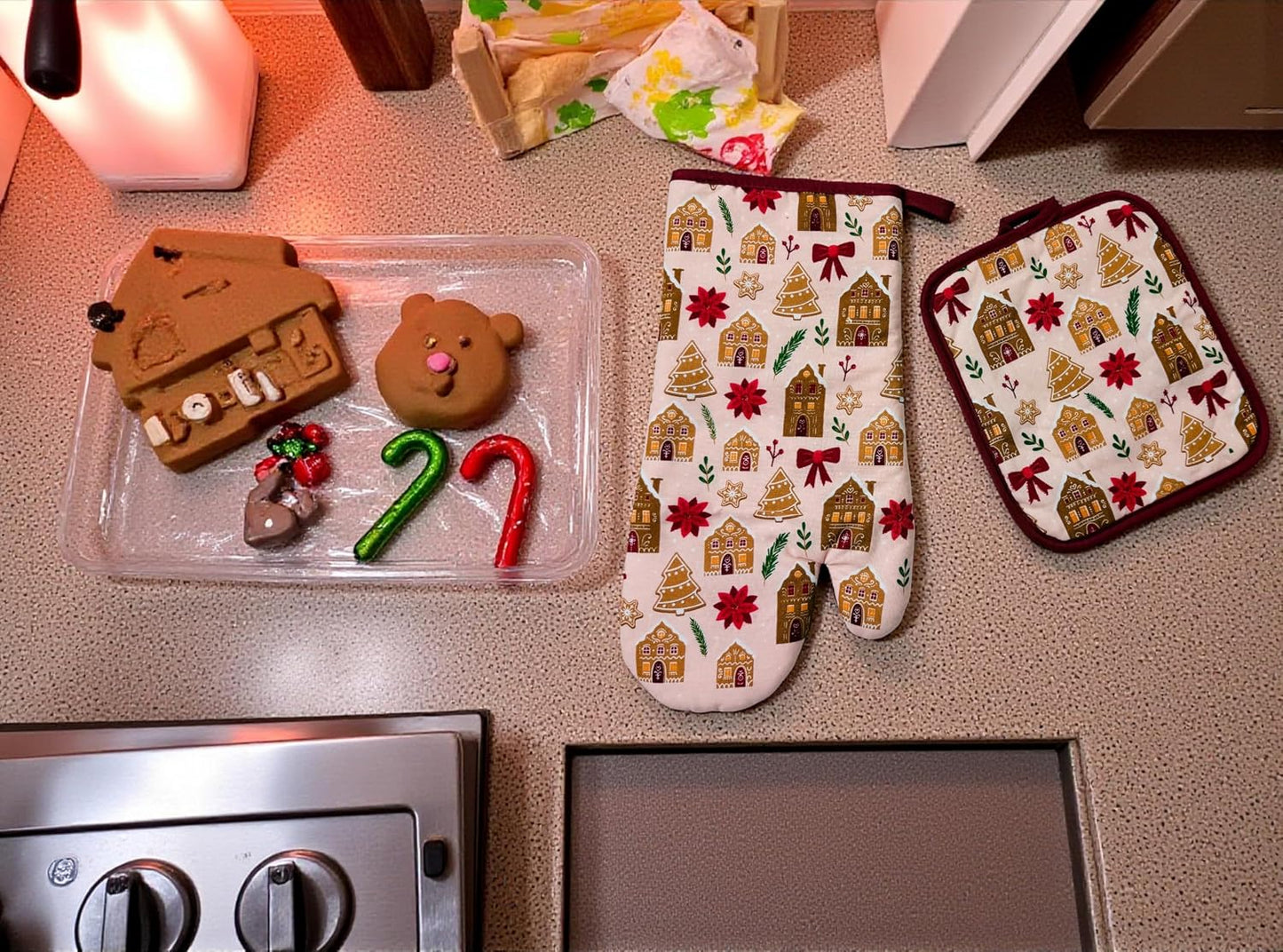 Holiday Kitchen Dish Towel and Pot Holders – Set of 3 100% Cotton Pink Gingerbread Houses, Trees, and Poinsettia Design – One (1) Kitchen Towel, One (1) Oven Mitt, and One (1) Pot Holder