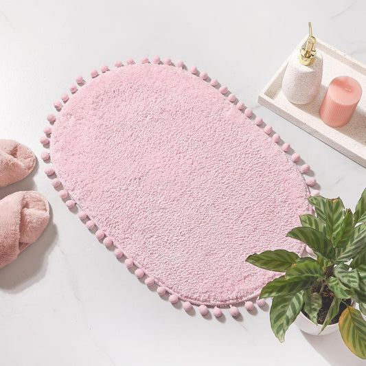 YIRDDEO Bath Mat Pink Rug with Pom Oval Bathroom Rugs for Bedroom Non Slip Cute Boho Absorbent Mats Soft Plush Washable Rug (20 x 30 inches)
