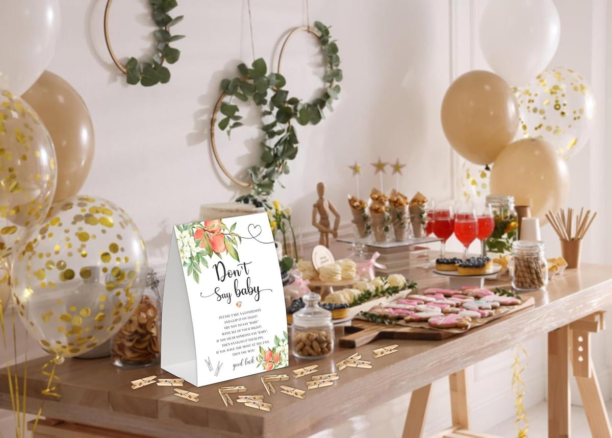 White Floral Peach Don't Say Baby Game for Baby Shower, Pack of One 5x7 Sign and 50 Mini Natural Clothespins, Sweet Peach Baby Shower Decoration, Gender Neutral Party Supplies - SC24