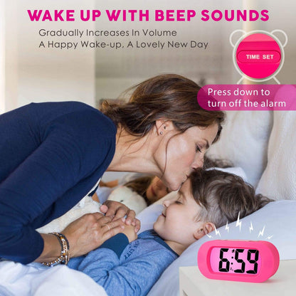 Kids Alarm Clock Large Digital LCD Travel Alarm Clocks with Snooze and Night Light - Ascending Sound and Handheld Sized - Best Gift for Kids (Pink)