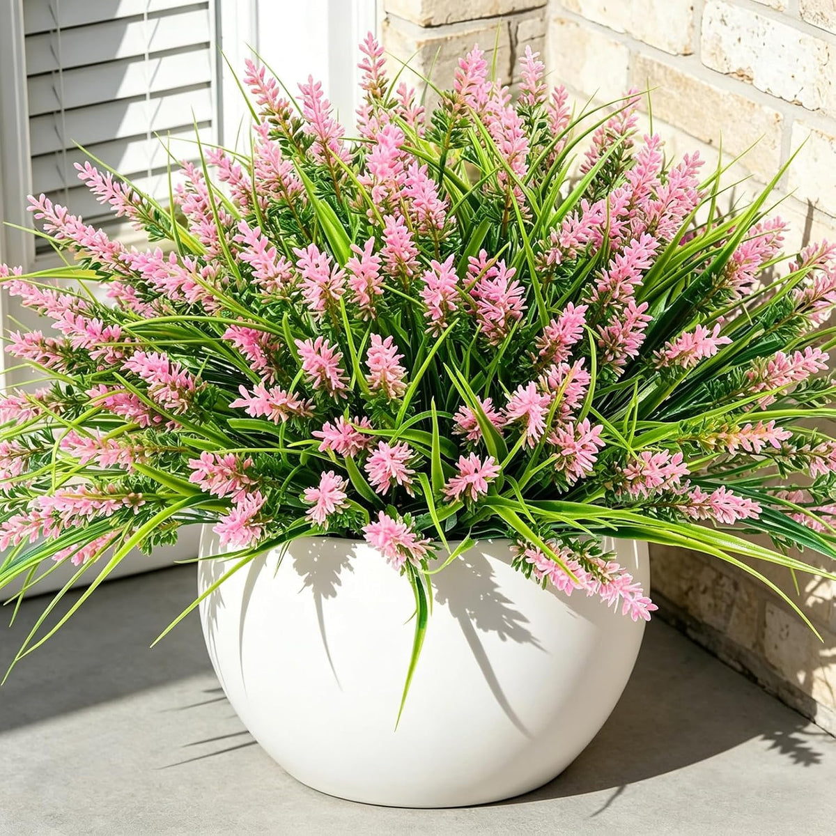 12Pcs Artificial Fake Flowers Monkey Grass for Outdoors, UV Resistant Realistic No Fade Faux Greenery Plants with Pink Flowers for Planter Home Garden Porch Patio Window Box