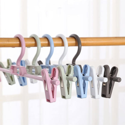 Pants Hangers, 10pcs Adjustable Clothes Hangers with Clips, Portable Drying Rack Travel Plastic Non-Slip Clothes Drying Hanger for Kids Or Adults Garments (Pink)