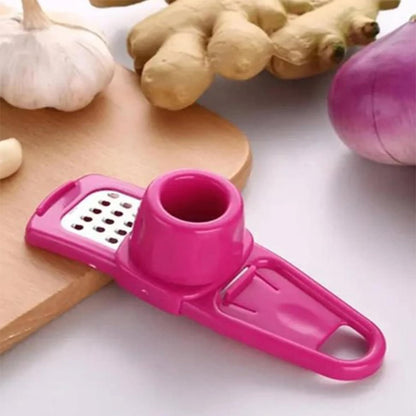 Multipurpose Garlic Mincer and Garlic Crusher - Easy Squeeze Clean Garlic Press, Dishwasher Safe Sturdy Tool Compact and Portable Design for Extracts More Paste Per Clove - Pink
